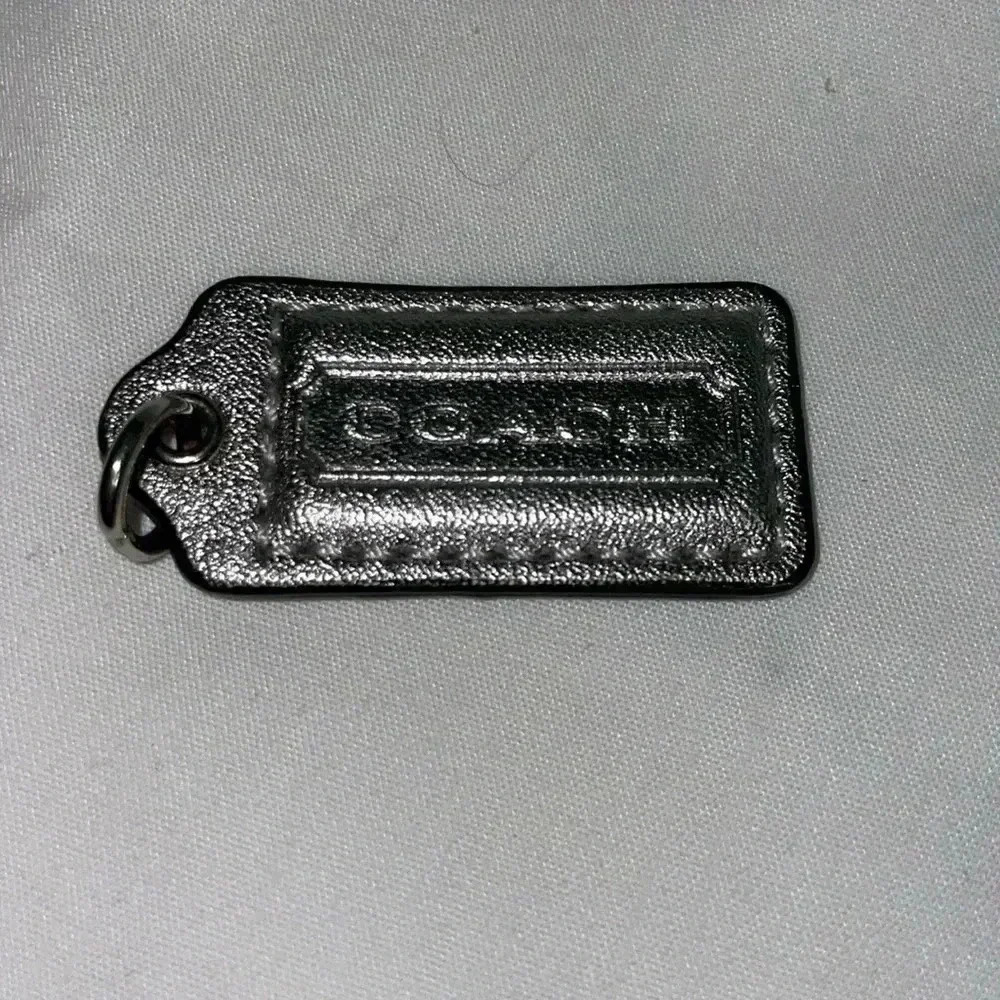 Silver Coach Handbag tag